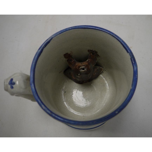 18 - 19th century Staffordshire 'Frog' tankard, a two-handled mug, E.M.& Co, two other mugs and a Cauldon... 