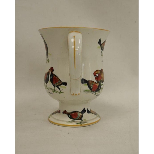 19 - Ceramic two-handled trophy cup decorated with fighting birds 'A Challenge', 'A Knock Down Blow', etc... 