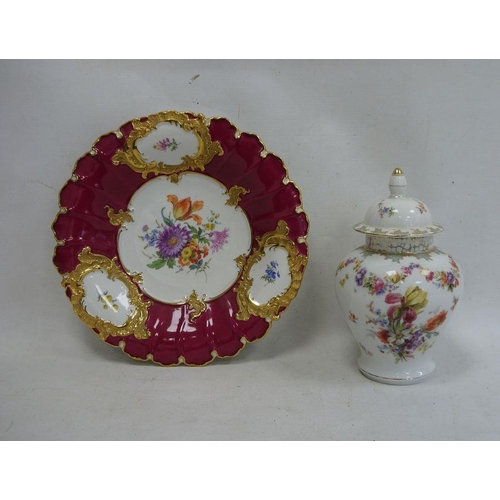 26 - Circular floral and gilt decorated dish with blue cross swords mark to reverse, 30cm high and a flor... 