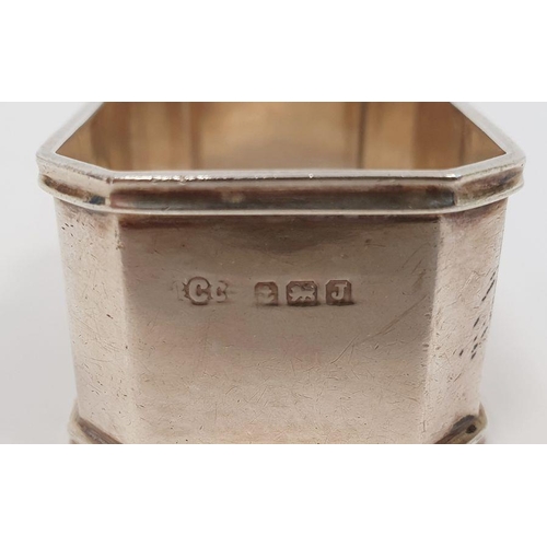 273 - 1930's rectangular silver napkin ring, initialled 'RMW', Birmingham 1933 and a 20th century silver-m... 