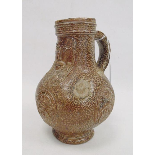 58 - Rhenish stoneware bellarmine jug applied three continental crests in oval tablets, 20cm high