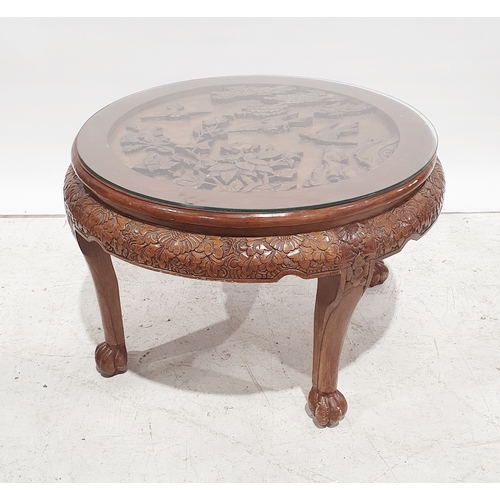 1276b - LOT WITHDRAWN
20th century Chinese hardwood circular table, carved decoration, 80cm diameter approx.