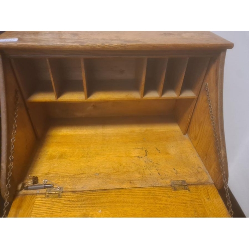 1126 - Early 20th century Arts & Crafts-style oak student's bureau, the fall with pigeonhole interior above... 