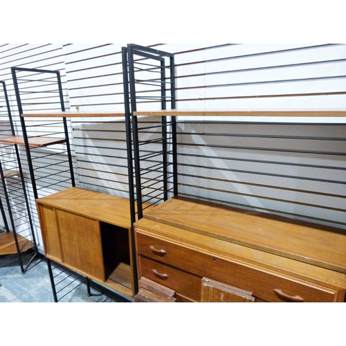 1151 - Mid century modern Ladderax shelving system to include cabinet with sliding doors, cupboard with thr... 