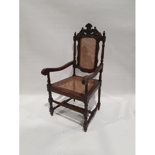 1321 - Early 20th century armchair with carved oak frame, with caned seat and back, turned and block front ... 