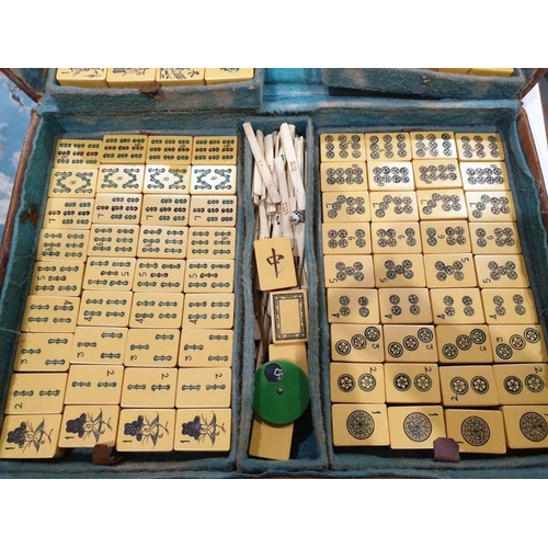 167 - Cased mahjong set in leather case