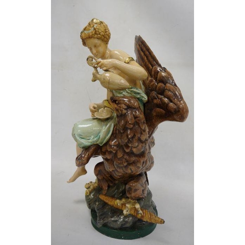 179 - Painted cast iron figure of female feeding eagle