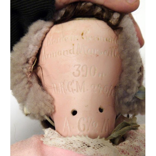 297 - Armand Marseille bisque headed doll no.390, marked 246/1, with blue sleeping eyes, pink dress, 52cm ... 