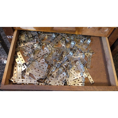 420 - Large quantity of Meccano, loose in two wooden collectors cabinets