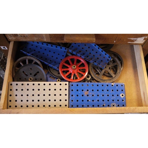 420 - Large quantity of Meccano, loose in two wooden collectors cabinets