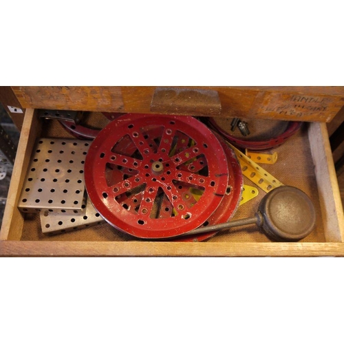 420 - Large quantity of Meccano, loose in two wooden collectors cabinets