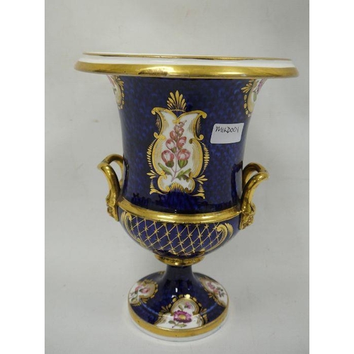 43 - Large Coalport-style two-handled campana vase with gilded decoration over a blue ground, floral pane... 