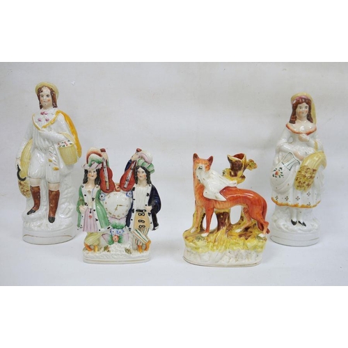 1 - Four 19th century Staffordshire flatback pottery models, one of fox as a spill vase, another of two ... 