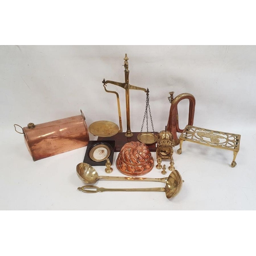 109 - Pair of brass balance scales on rectangular mahogany base, a copper jelly mould, a brass trivet, a m... 