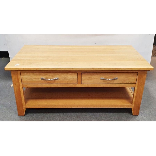 1102C - 20th century oak coffee table, the rectangular top above drawers and over shelved undertier and an o... 