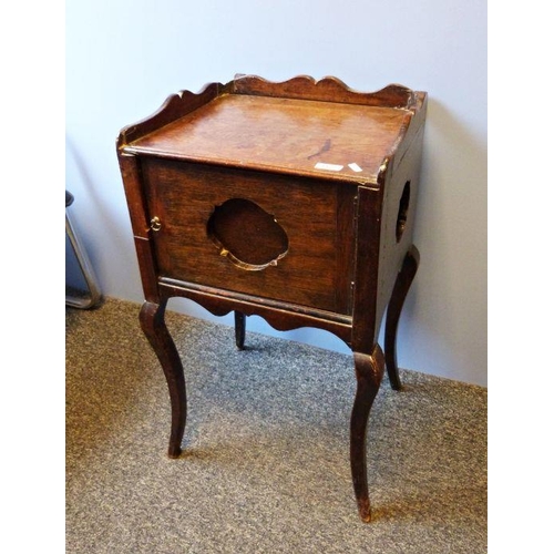 1122 - Continental oak cupboard with three-quarter gallery top, towel rail to back, single door, on cabriol... 