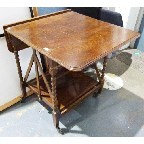 1134 - 20th century oak folding two-tier tea trolley, marked on ivorine plaque 'Troltab, pat.286458'