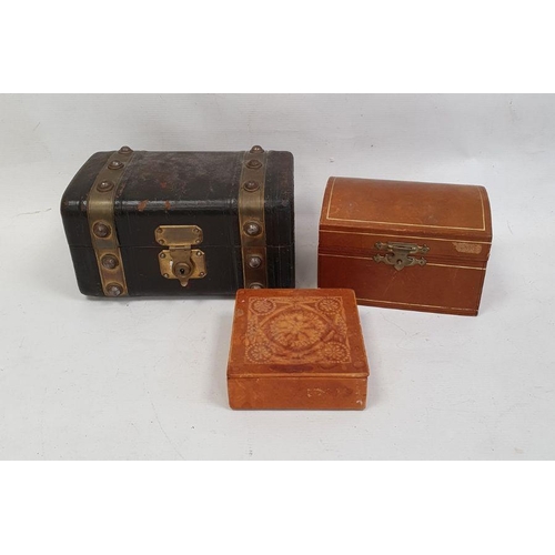 115 - Victorian leather jewellery box modelled as a trunk with brass mounts and two further leather boxes ... 