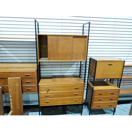 1151 - Mid century modern Ladderax shelving system to include cabinet with sliding doors, cupboard with thr... 