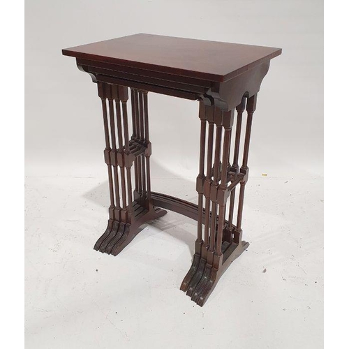 1165 - Quartetto nest of four 20th century mahogany tables