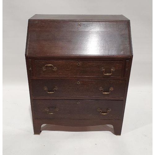 1180 - 20th century oak bureau with three drawers, on bracket feet, 76cm wide