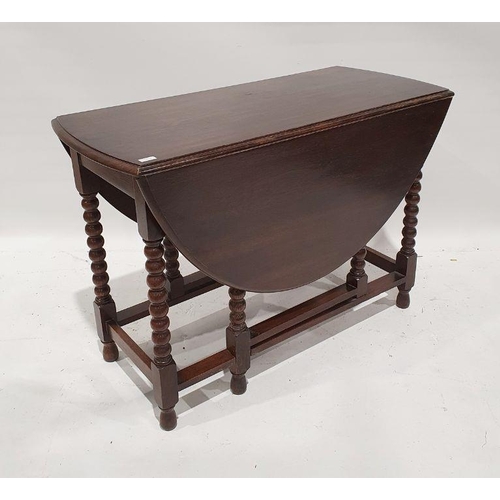 1196 - 20th century oak oval top gateleg table on barleytwist supports, 102cm x 50cm x 73cm