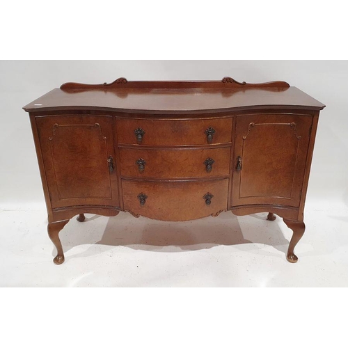 1199 - Early 20th century walnut serpent-fronted sideboard with three short drawers to centre flanked by tw... 