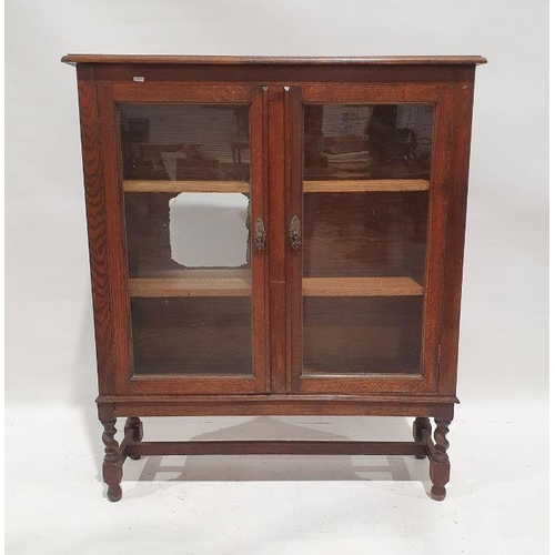 1225 - 20th century stained oak glazed cabinet on barleytwist supports