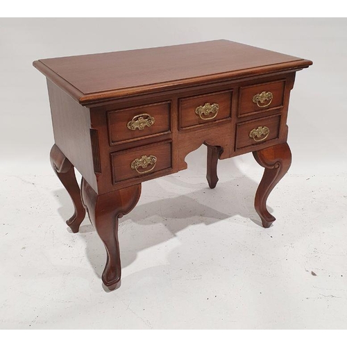 1238 - Modern mahogany lowboy, the rectangular top with applied moulded edge above five assorted drawers, t... 