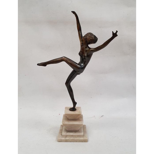 125 - Art Deco style bronze figure of a dancing nude female, on stepped marble base, 40cm high