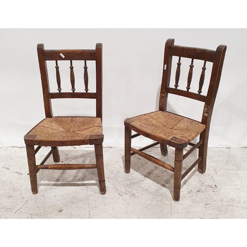 1251 - Pair of early 20th century child's rush seated chairs on turned front legs and stretchers (2)