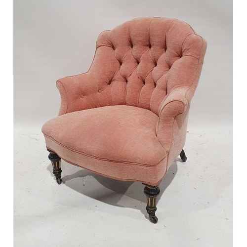 1263 - Pair of late Victorian armchairs in pink ground upholstery, turned and fluted front legs to black ch... 