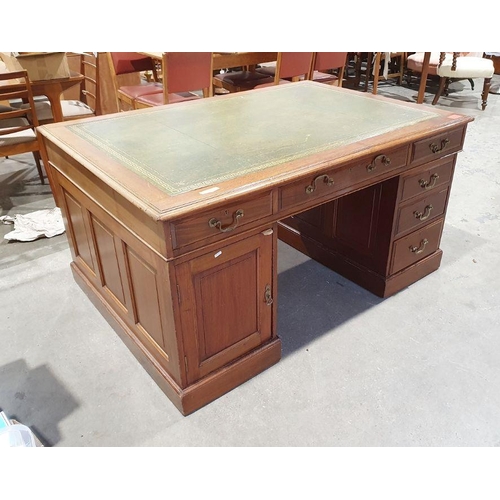 1267 - Partner's pedestal mahogany desk with green leather writing surface, with assorted drawers and cupbo... 