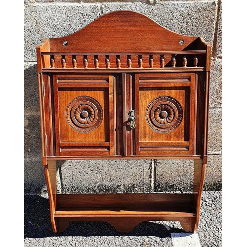 1278 - James Shoolbred of London wall-hanging cabinet, the arched back above spindle turned gallery, two cu... 