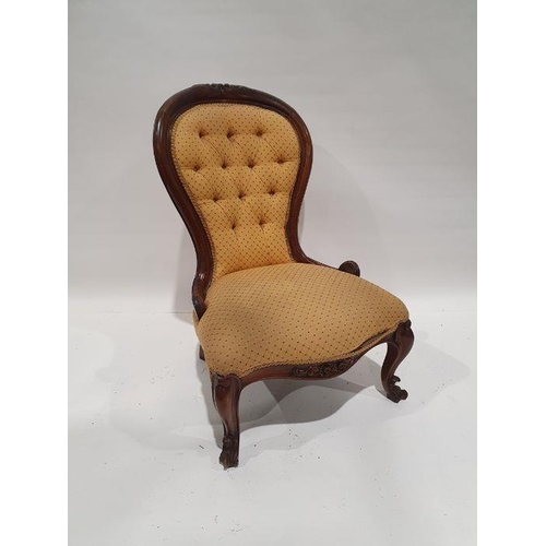 1289 - Victorian-style low chair in yellow upholstered seat and back, on carved front legs