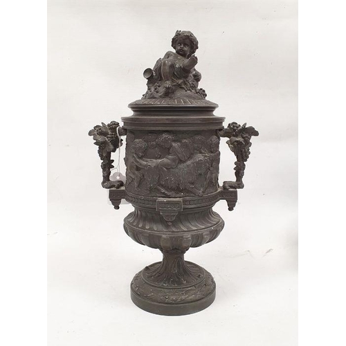 129 - Bronze two-handled urn decorated with a continuous band of cherubs in a Bacchanalian scene, the cove... 