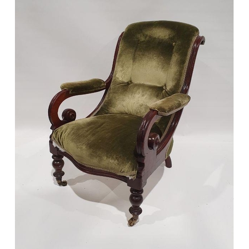 1294 - Late Victorian armchair with overscrolled arms, on turned front legs to brass castors, green upholst... 