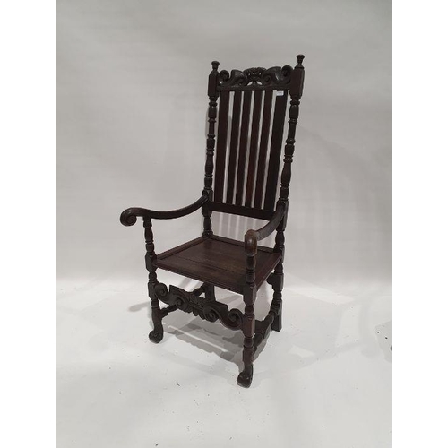 1323 - 20th century armchair with carved top rail above slatted back, carved arm rests, turned, carved and ... 