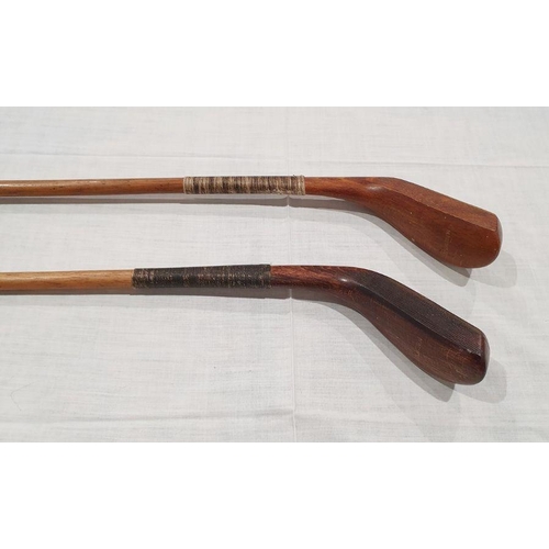 163 - Pair of replica golf clubs stamped 'McEwan and made in Scotland Replica' (2)