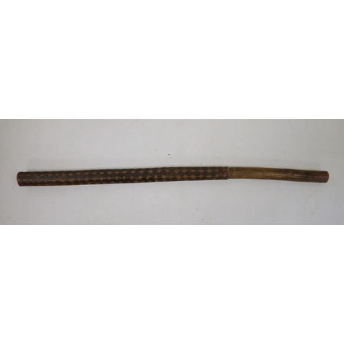 171 - Carved wooden baton/club, possibly Oceanic, with geometric decoration and plain handle, 56cm long