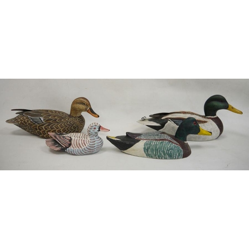 178A - Holland & Holland painted wood mallard decoy duck, another and two further decoy ducks (4)