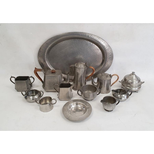 227 - Hammered pewter oval tray, a three-piece hammered pewter teaset and various other pewter teawares