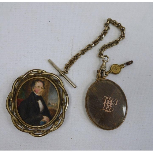 246 - Victorian gilt metal brooch set with a half-length miniature portrait of a gentleman with book withi... 