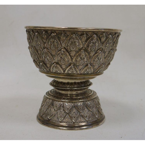 254 - Late 19th century Indian white metal pedestal bowl of circular form with stylised geometric leaf dec... 