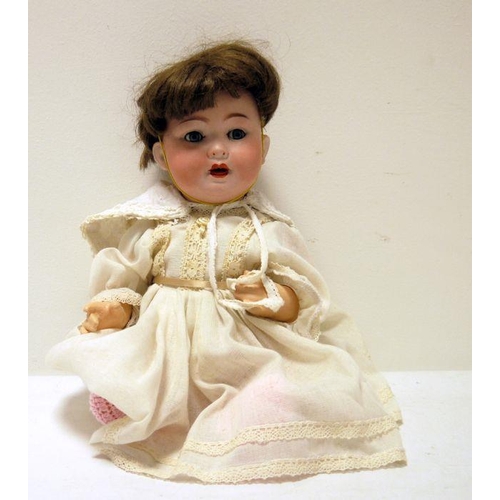 266 - German bisque porcelain headed doll with sleeping eyes and open mouth, composition body, 38cm high