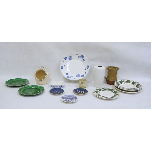 27 - Studio pottery terracotta jug, a white ground vase, a salt pig, assorted plates and bowls, etc (16)