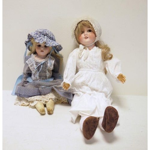 298 - German bisque headed doll with sleeping brown eyes and in white nightgown and lace cap, 63cm and a b... 