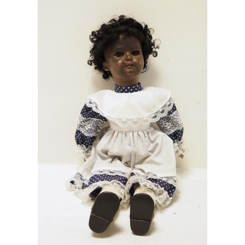 299 - Simon & Halbig bisque headed mulatto girl doll, no.1079, in lace trimmed blue polka dot dress with p... 