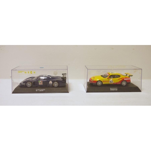 364 - Two boxes of Scalextric slot cars to include Maserati MC12 and Maserati Coupe Cambiocorsa (2)