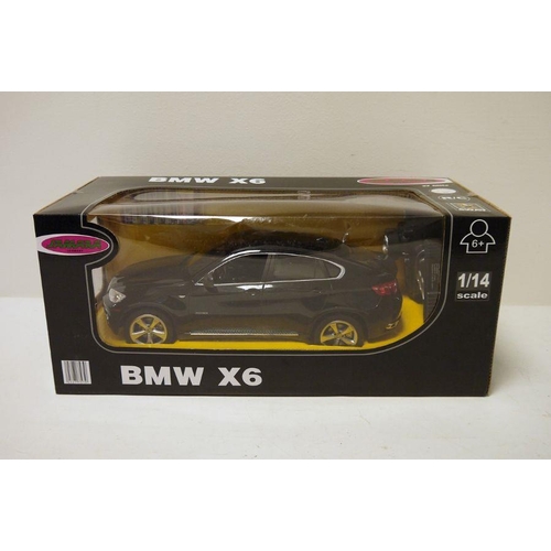 388 - Boxed Jamara 1/14 scale radio controlled car, BMW X6 in black, including original fittings, battery ... 